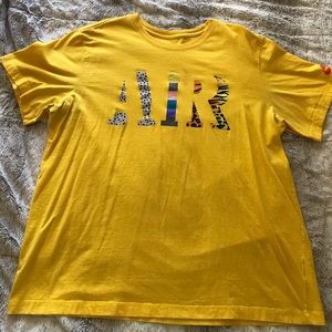 Yellow Nike air short sleeve shirt. XL